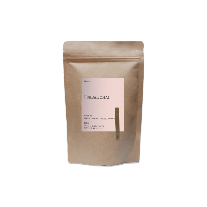 Kraft paper packaging of herbal chai with a label on a white background