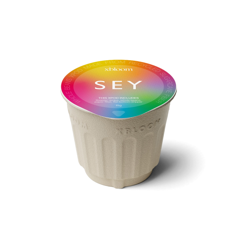 xBloom x SEY coffee xPod with colorful lid on a white background
