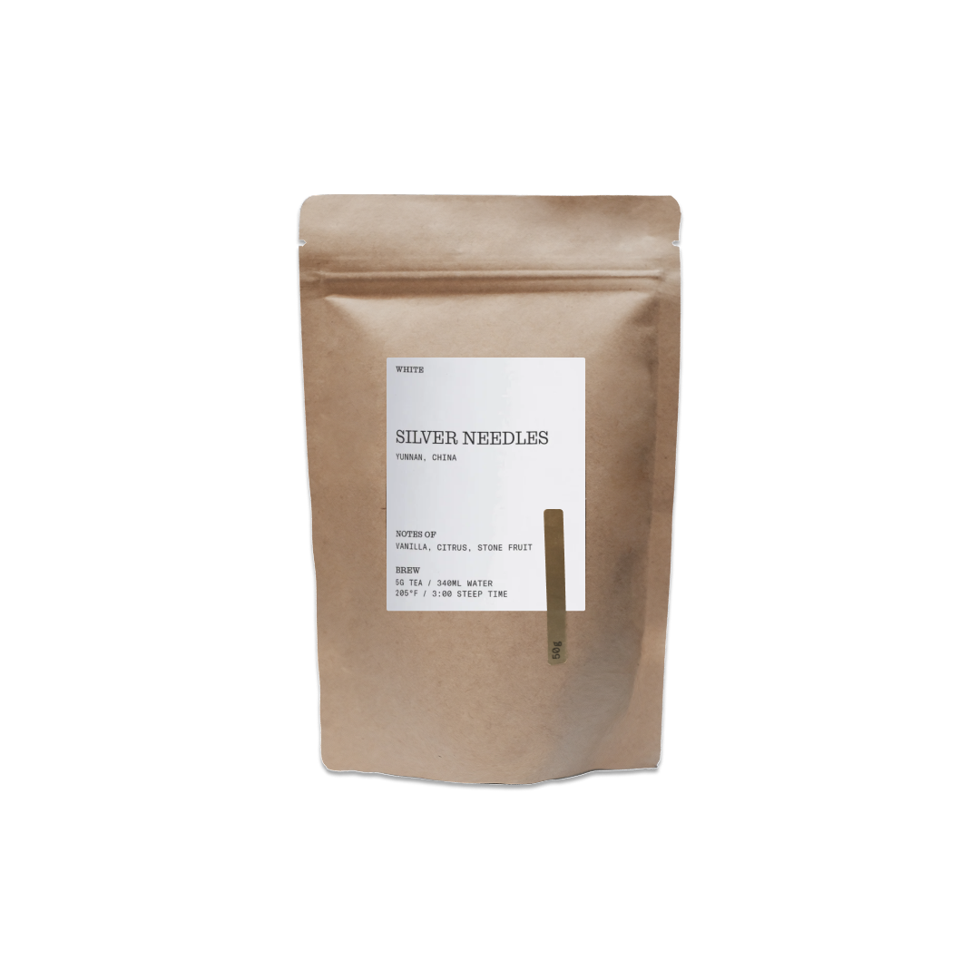 Kraft paper tea bag with a label on a white background