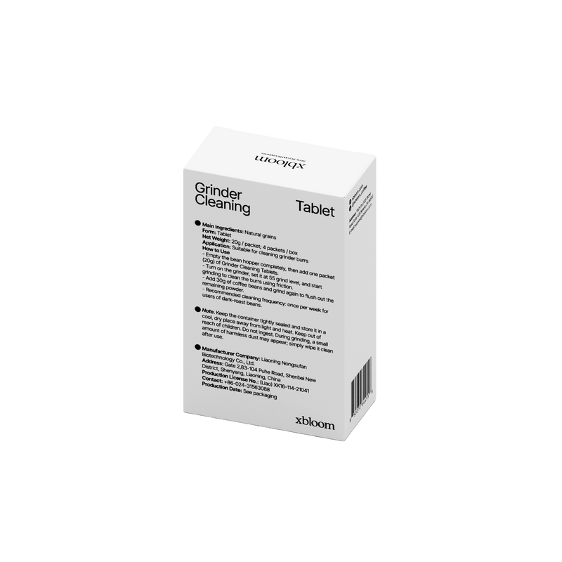 Box of grinder cleaning tablets on a white background