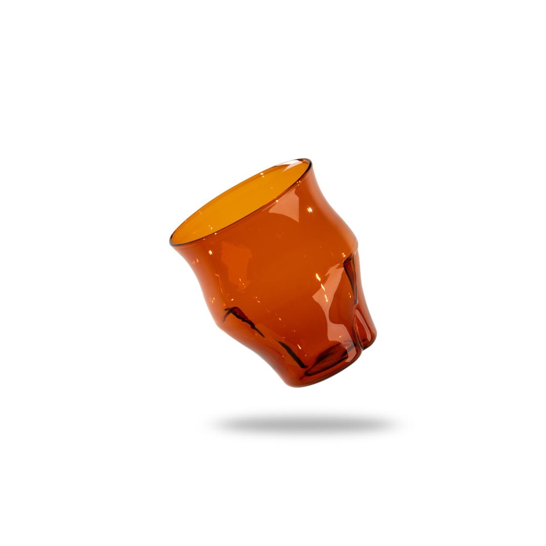 Amber glass vase on a white background