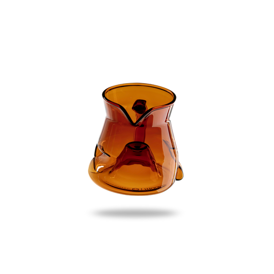 Amber-colored glass vase on a white background