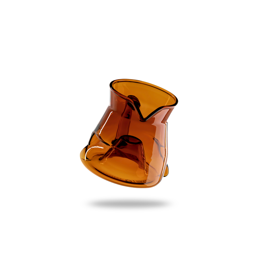 Amber-colored glass object on a white background
