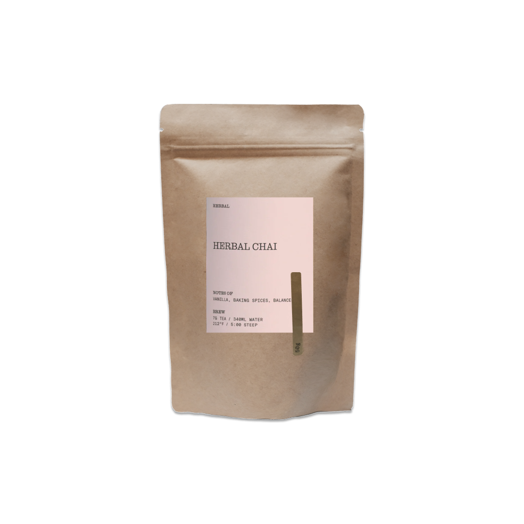 Kraft paper packaging of herbal chai with a label on a white background