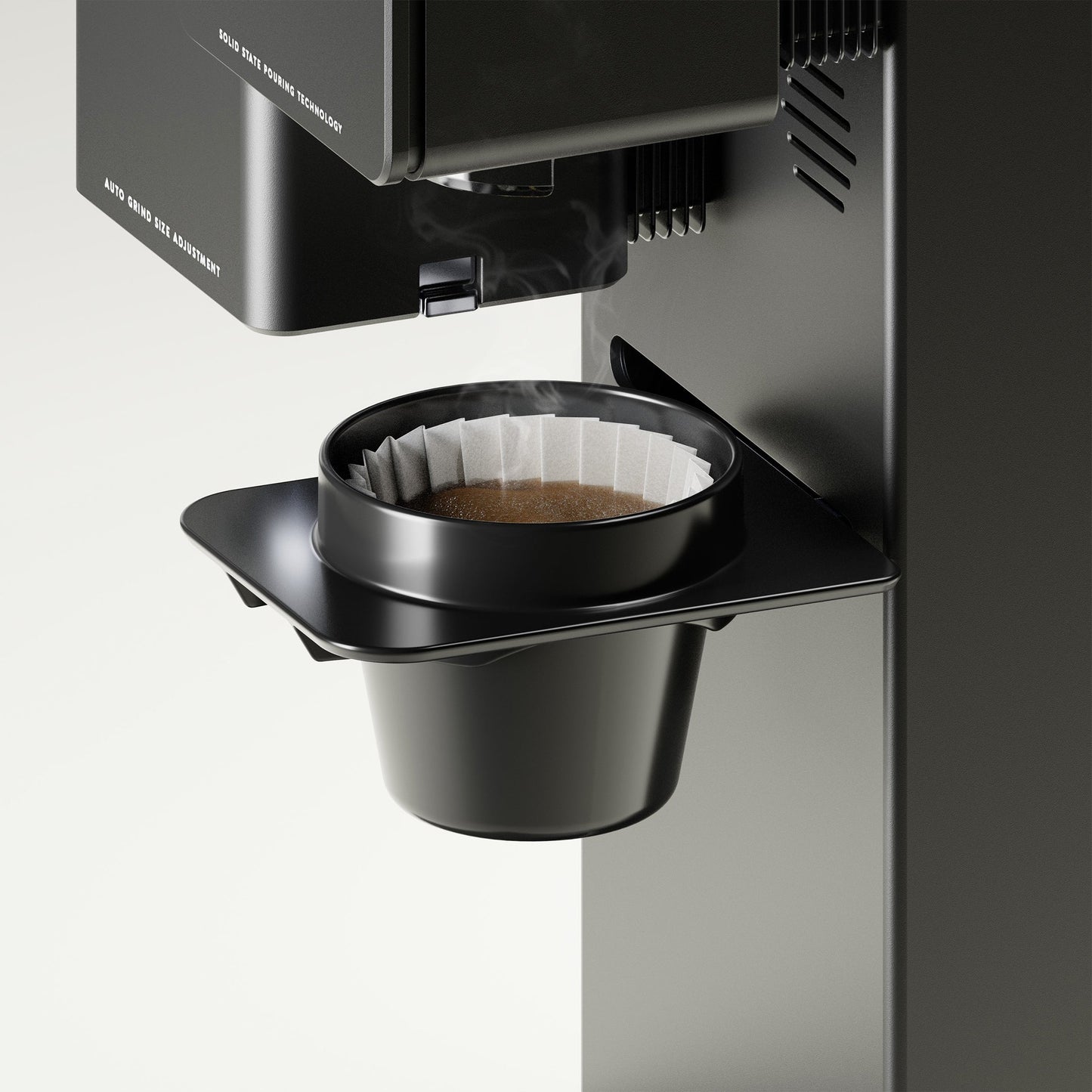 xbloom Original with a black omni dripper, brewing coffee with a paper filter.