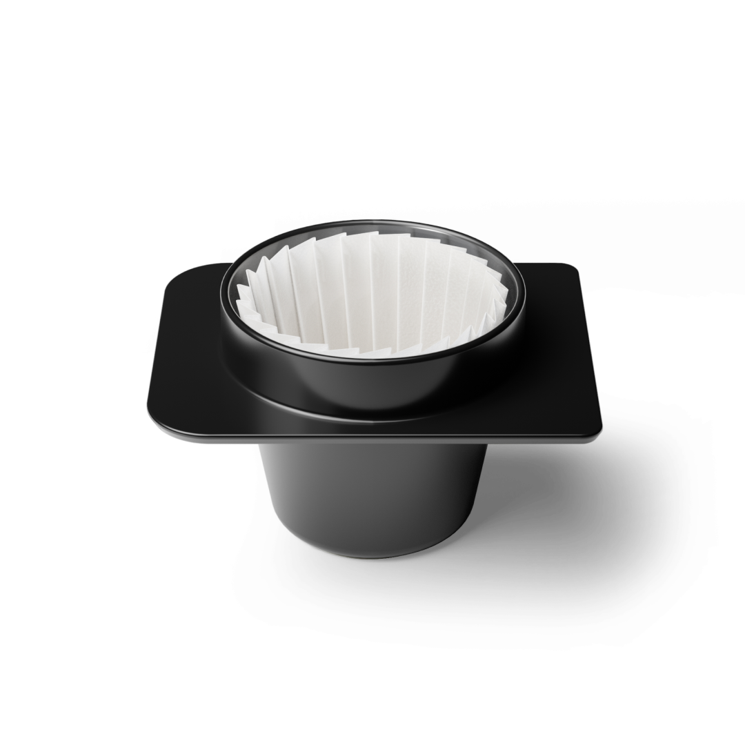 Omni Dripper with a paper filter, shown isolated on a transparent background