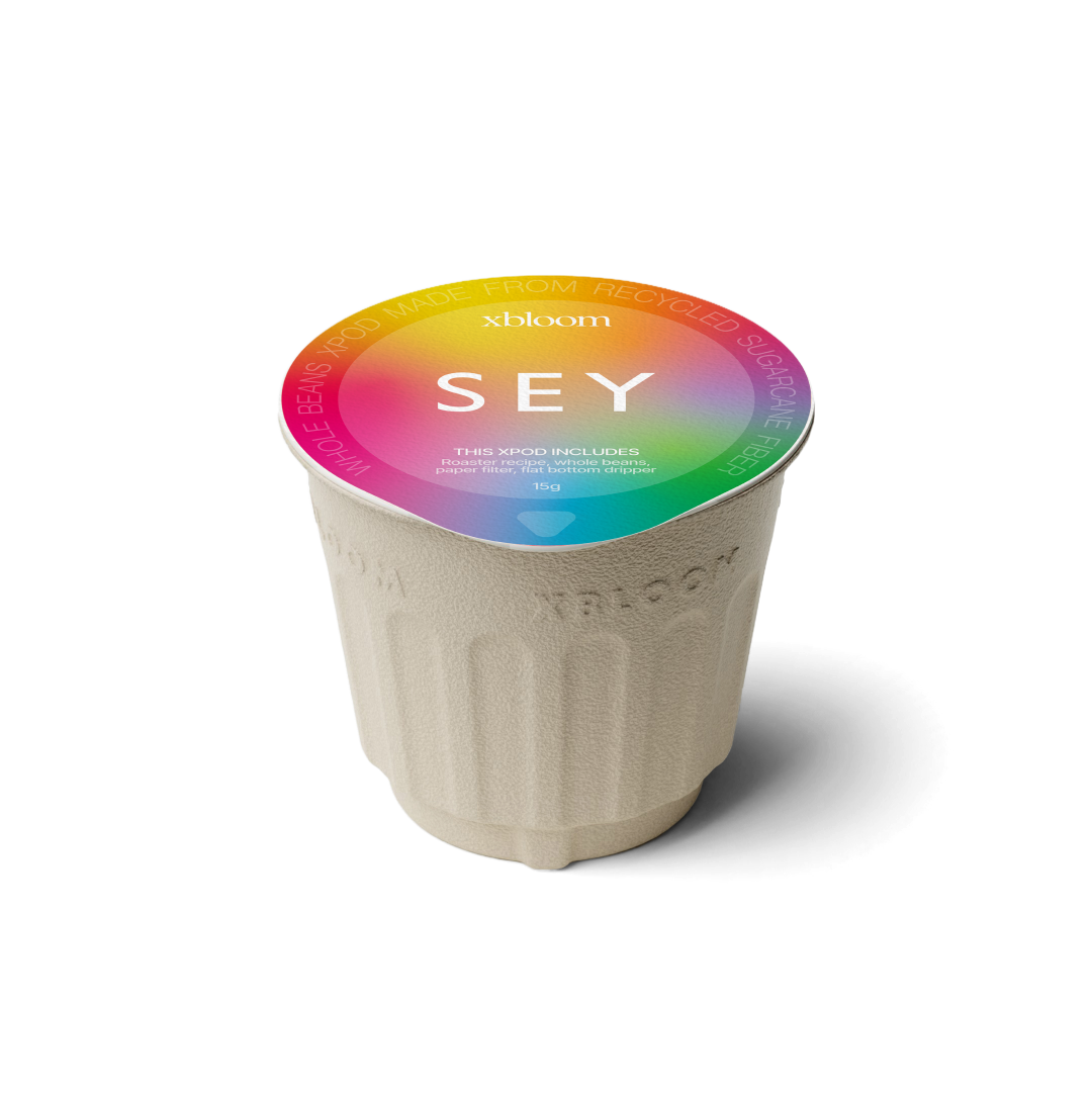 xBloom x SEY coffee xPod with colorful lid on a white background
