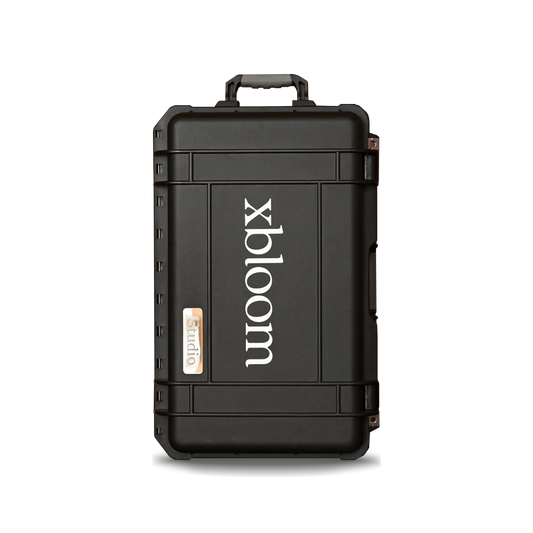 Black hard-shell case with 'xbloom' branding on a white background