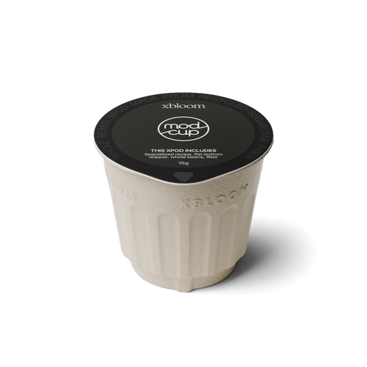 xBloom x Modcup coffee pod on a white background